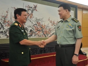 越南国防部副部长阮成弓上将与中国人民解放军总政治部主任张阳上将
