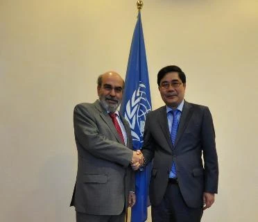 FAO总干事若泽·格拉齐亚诺·达席尔瓦与越南农业与农村发展部部长高德发