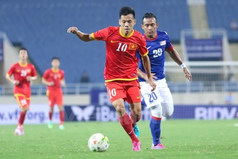 2014年东南亚男足锦标赛：越南队以2比1反超马来西亚主场队取胜