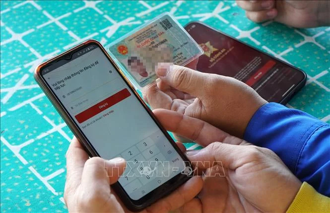 Hanoi is set to provide more public services via e-identification app VNeID. (Photo: VNA)