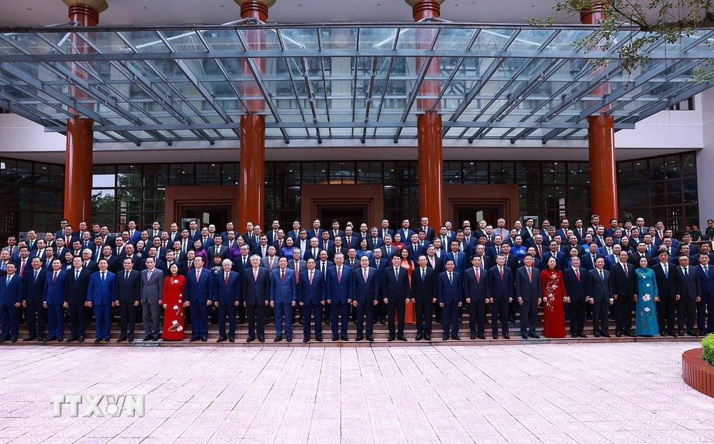 Members of the 13th-tenure Party Central Committee at a meeting in Hanoi on August 3 (Photo: VNA)