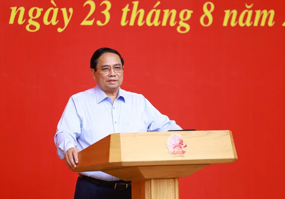 PM Pham Minh Chinh addresses the third meeting of the 14th National Party Congress's sub-committee for socioeconomic affairs on August 23. (Photo: VNA)