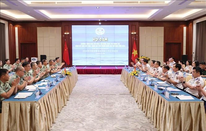 The talks between the Vietnam Coast Guard and the China Coast Guard in Hanoi on August 27 (Photo: VNA)