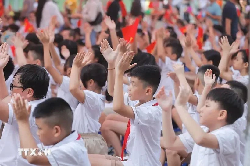 Students of the Gia Quat Primary School in Hanoi's Long Bien district at the opening ceremony of the 2024 - 2025 academic year on September 5. (Photo: VNA)