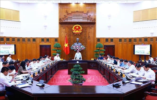 PM Pham Minh Chinh chairs the meeting on the North - South high-speed railway project and the implementation of railway projects connecting with China on October 5. (Photo: VNA)