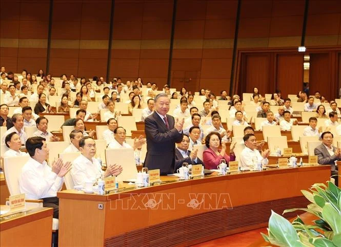 Party General Secretary and State President To Lam (standing) and other officials at the conference held on October 20 (Photo: VNA)