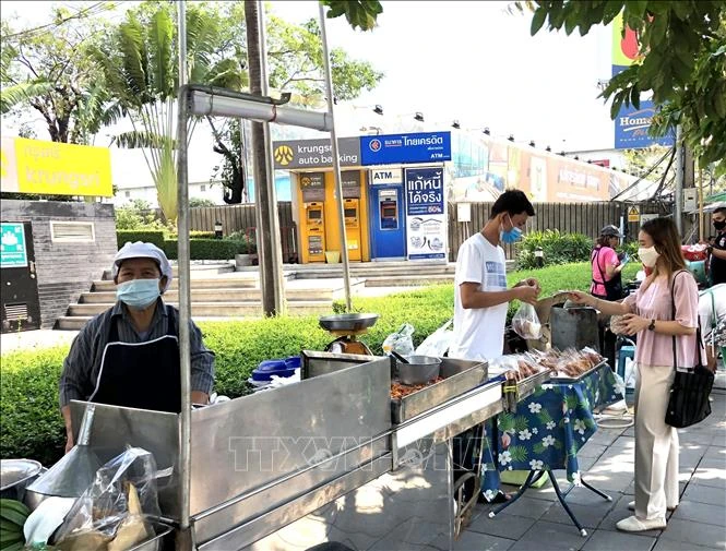 Vendors on a street in Bangkok, Thailand (Photo: VNA)