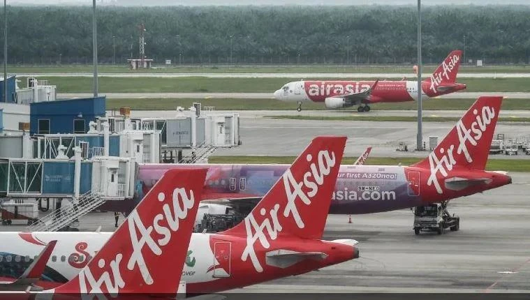 AirAsia will start imposing a mandatory carbon fee on all passengers starting January 1, 2025. (Photo: AFP)