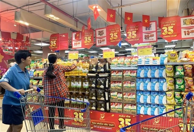 Shoppers at a Co-op supermarket in HCM City. (Photo: VNA)