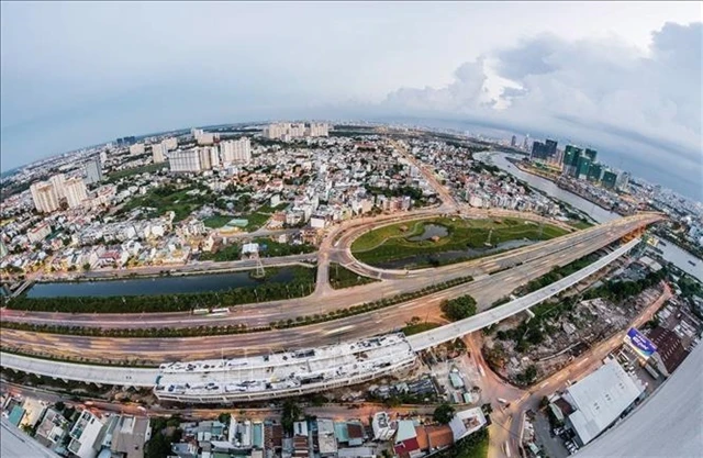 A view of HCM City's District 2 with Hanoi Highway and Metro Line 1 Ben Thanh - Suoi Tien. District 2 is undergoing development to emerge as a financial hub. (Photo: VNA)