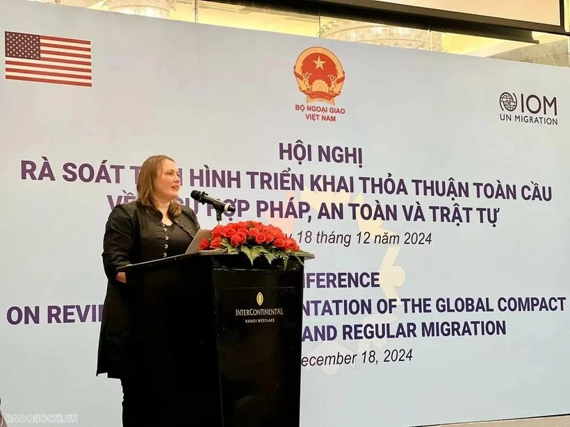 IOM Chief of Mission Kendra Rinas speaks at the conference in Hanoi on December 18. (Photo: VNA)