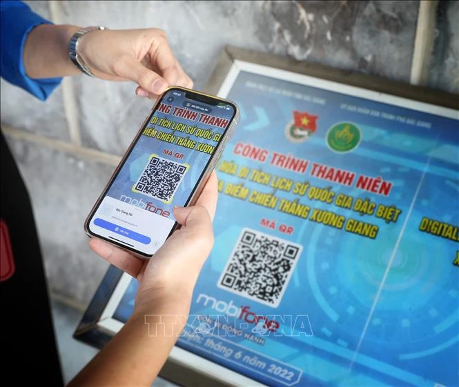 Scanner le code QR pour en savoir plus sur le site spécial national de la victoire de Xuong Giang. Photo: VNA