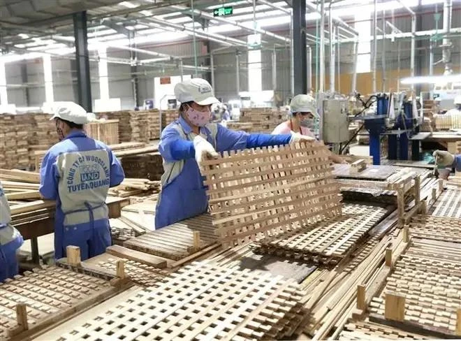 Productos de madera exportados a Suiza en la fábrica de Woodsland Tuyen Quang (Foto: VNA)