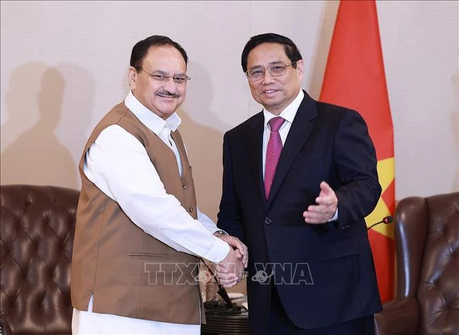 Le Premier ministre Pham Minh Chinh (droite) et le président du Parti du peuple indien (Bharatiya Janata Party-BJP), Jagat Prakash Nadda. Photo: VNA