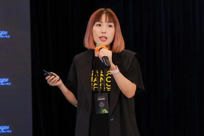 Lynn Hoang, directora nacional de la empresa Binance, habla en el evento. (Foto: Comité Organizador)