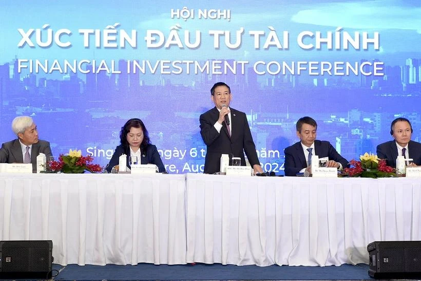 El ministro de Finanzas, Ho Duc Phoc, habla en el evento. (Foto: Vietnam+)