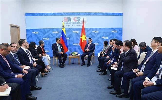 El primer ministro de Vietnam, Pham Minh Chinh, y el presidente de Venezuela, Nicolás Maduro. (Foto: VNA)