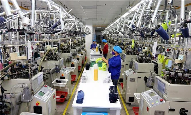 La chaîne de production de chaussettes de la sarl Jasan Vietnam, investie par la Chine, dans le Parc industriel VSIP Hai Phong. Photo d'archives : VNA