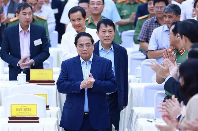 Le Premier ministre Pham Minh Chinh à la sécurité et l'ordre au service du développement socio-économique des provinces des Hauts Plateaux du Centre à Lam Dong. Photo : VNA