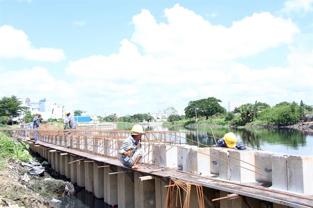 Construction of the water drainage project for Tham Luong – Ben Cat – Rach Nuoc Len Canal in HCM City to be completed in 2025. (Photo: VNA)