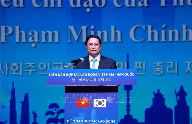Prime Minister Pham Minh Chinh speaking at Vietnam-RoK Labour Cooperation Forum (Photo: VNA)
