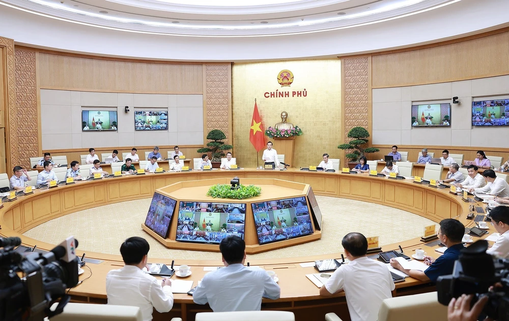 An overview of the national teleconference (Photo: VNA)