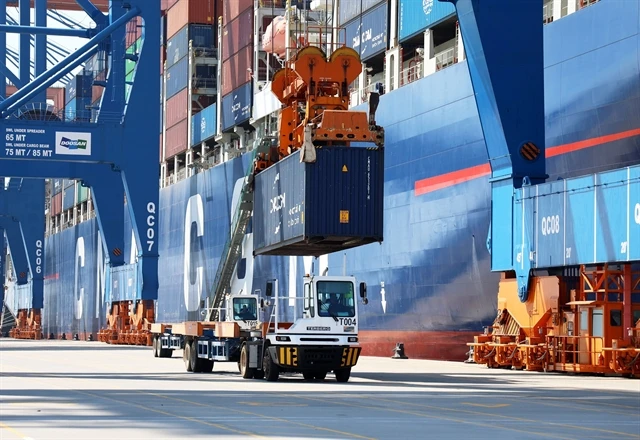 Containers being loaded at Gemalink International Port in Ba Ria - Vung Tau province (Photo: VNA)