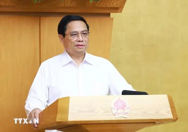 Prime Minister Pham Minh Chinh speaks at the session. (Photo: VNA)