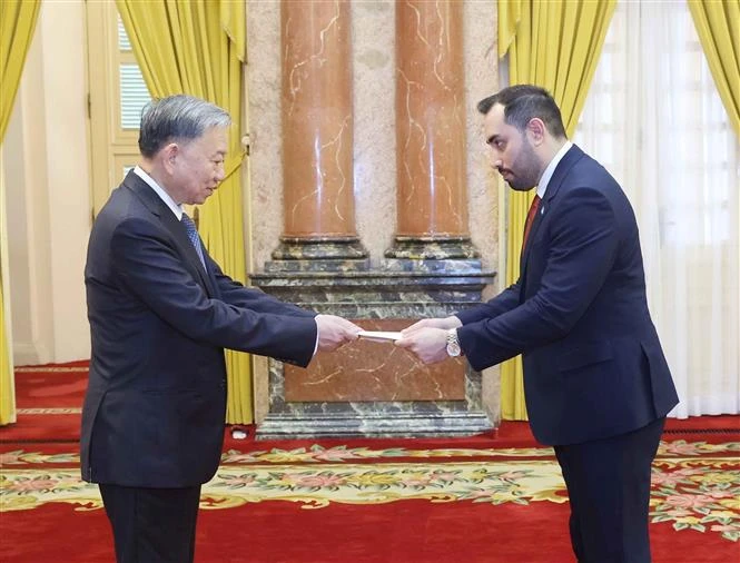 President To Lam (L) and Nicaraguan Ambassador Mario Jose Armengol Campos at the event in Hanoi on June 21. (Photo: VNA)