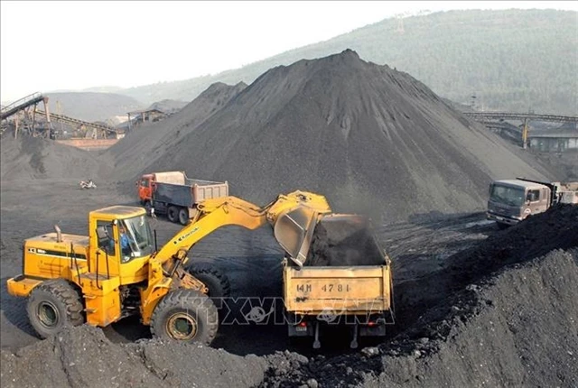 At a coal mining site (Photo: VNA)