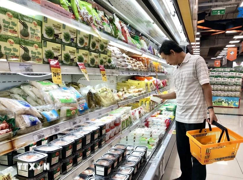 A shopper in Ho Chi Minh City (Photo: VNA)