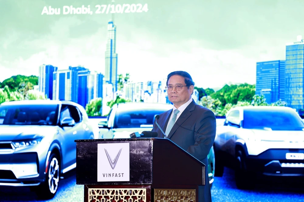 Prime Minister Pham Minh Chinh addresses the ceremony launching VinFast electric vehicles in the UAE (Photo; VNA) 