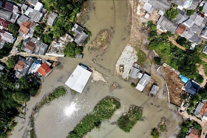 Le bilan des inondations en Indonésie s'alourdit. Photo: AFP/VNA 