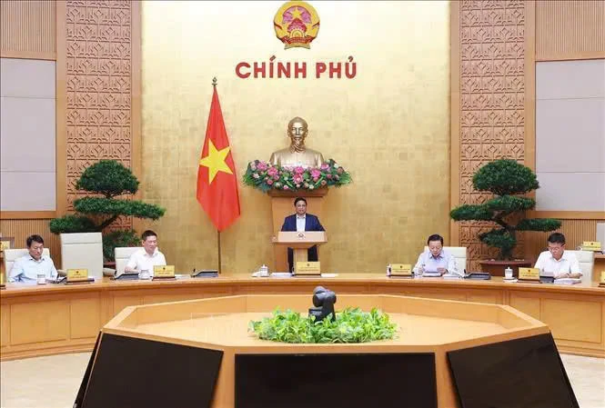 Prime Minister Pham Minh Chinh chairs the Government’s October regular meeting on November 9. (Photo: VNA)