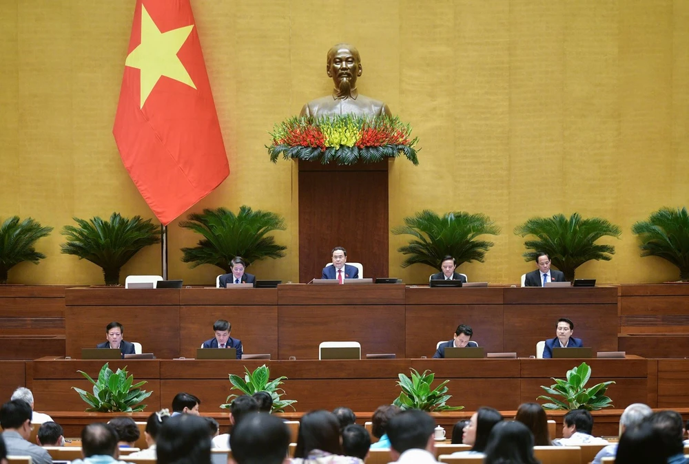 NA deputies question Cabinet members on auditing, culture, sports and tourism issues on June 5 (Photo: VNA)