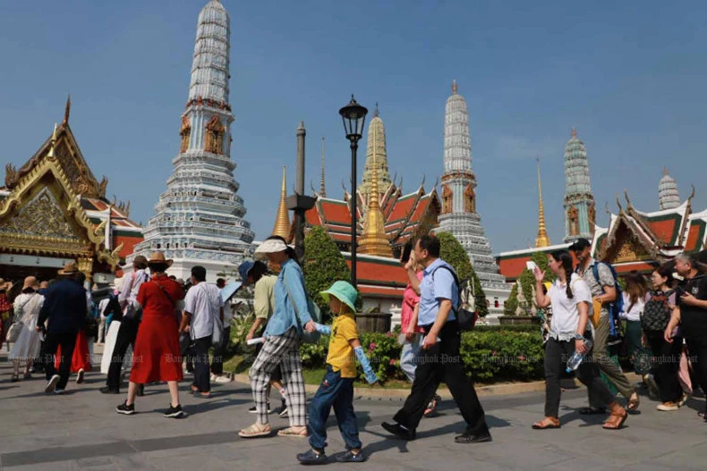 Tourists walk towards Wat Phra Kaeo inside the Grand Palace, which remains one of Thailand’s leading tourist attractions (Photo: Bangkok Post)