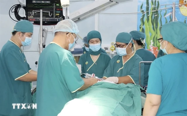 Doctors at Children's Hospital 2 in HCM City perform organ transplant surgery on a child. (Photo: VNA)