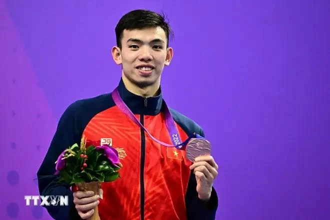 Swimmer Nguyen Huy Hoang is among 16 Vietnamese athletes who will compete in the 2024 Paris Olympics later this month. (Photo: VNA)