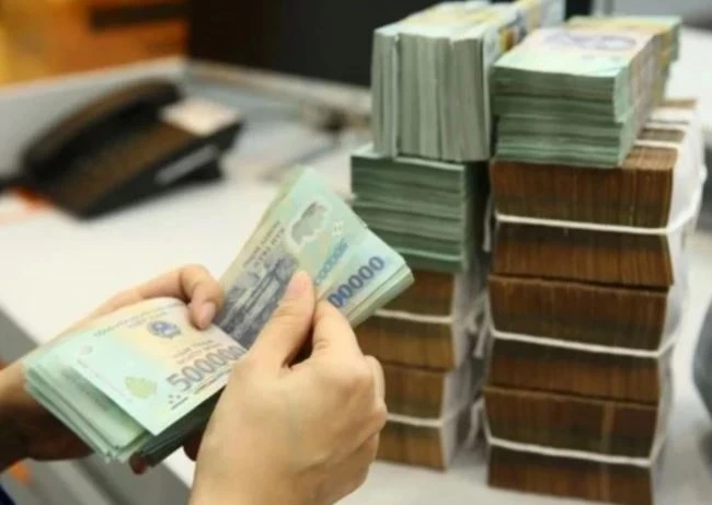 The central bank is ready to restructure debt to back business recovery. (Photo: VietnamPlus)