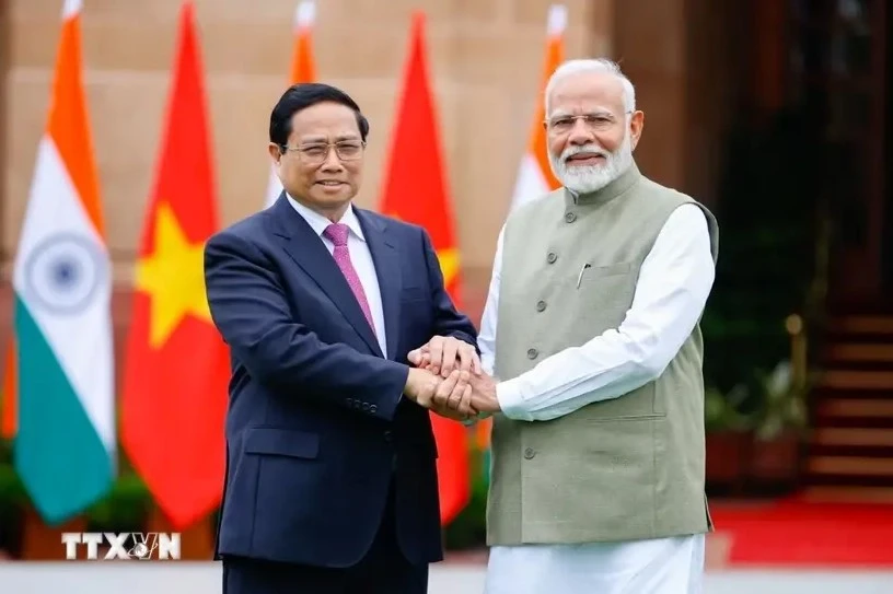 Prime Minister Pham Minh Chinh (L) and Indian Prime Minister Narendra Modi (Photo: VNA)