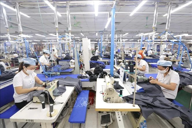 Production at May 10 company in Hanoi (Photo: VNA)