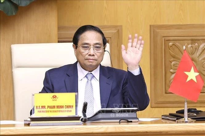 Prime Minister Pham Minh Chinh virtually attends the the third Voice of Global South Summit chaired by Indian PM Narendra Modi on August 17. (Photo: VNA)