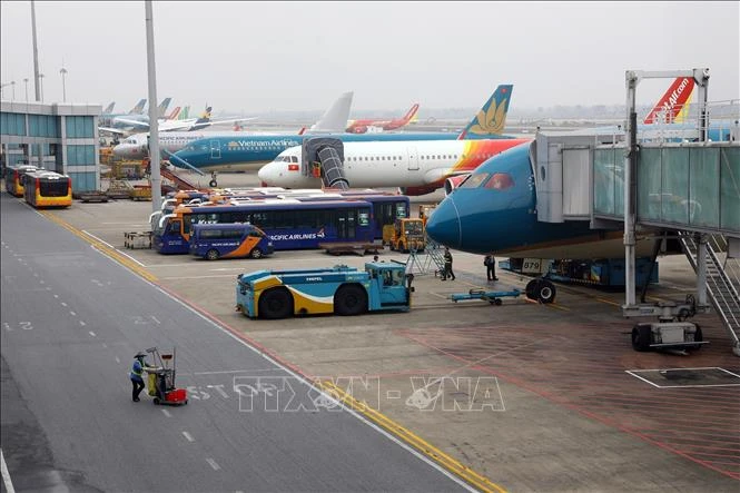 At Noi Bai International Airport in Hanoi (Photo: VNA)