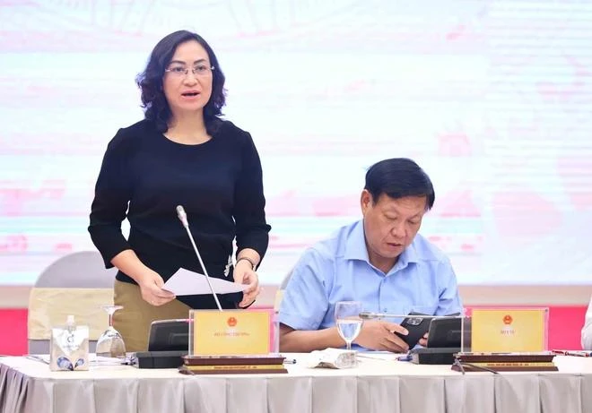 Deputy Minister of Industry and Trade Phan Thi Thang speaks at the meeting. (Photo: VietnamPlus)