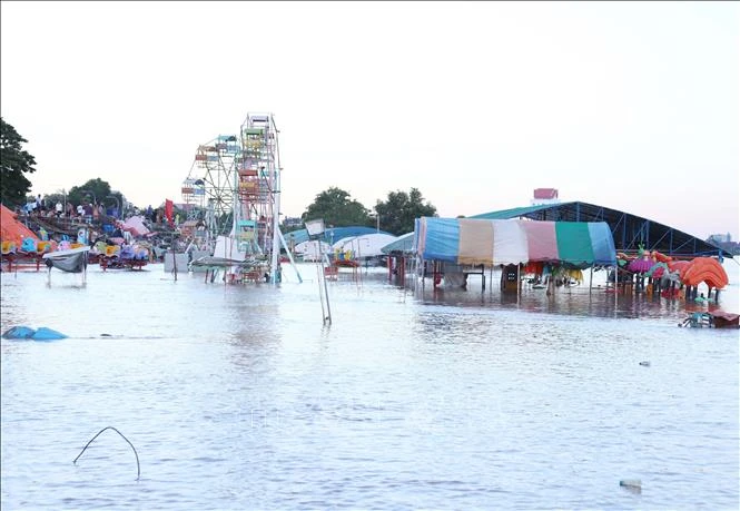 An entertainment zone for kids in Vientiane is inundated due to heavy rains. (Photo: VNA)