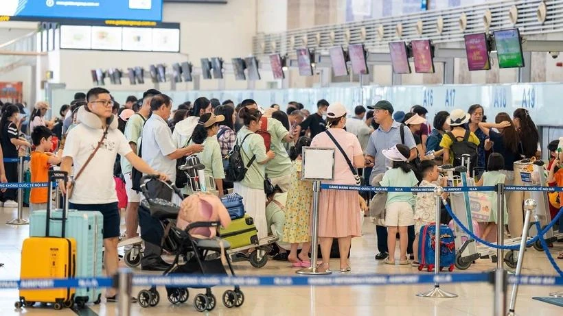 Passengers at Noi Bai International Airport (Photo: VNA)