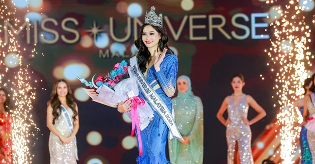 Newly crowned Miss Universe Malaysia 2024, Sandra Lim, in a Sea of Dreams evening gown by a Vietnamese design house - MINHTUAN Couture. (Photo courtesy of MINHTUAN Couture)