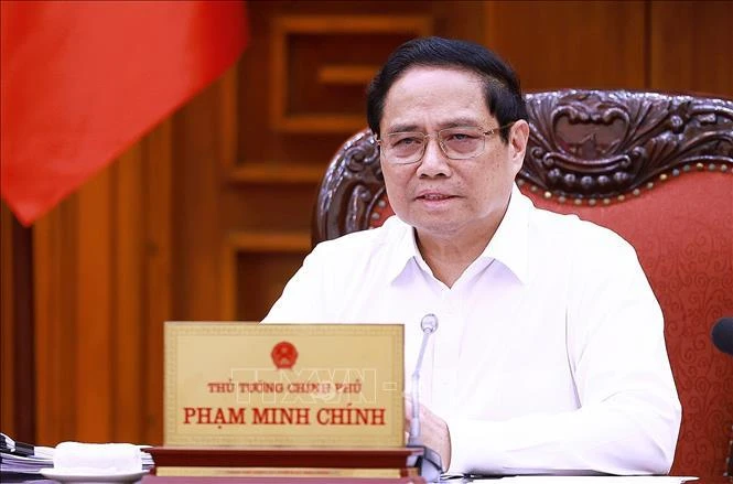 PM Pham Minh Chinh speaks at the meeting (Photo: VNA)