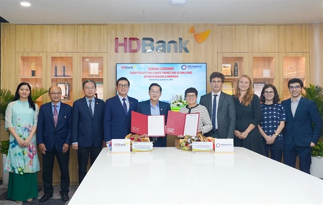 HDBank and Proparco’s leaders at a ceremony for signing a credit facility worth US$50 million in HCM City on September 16. (Photo courtesy of HDBank)