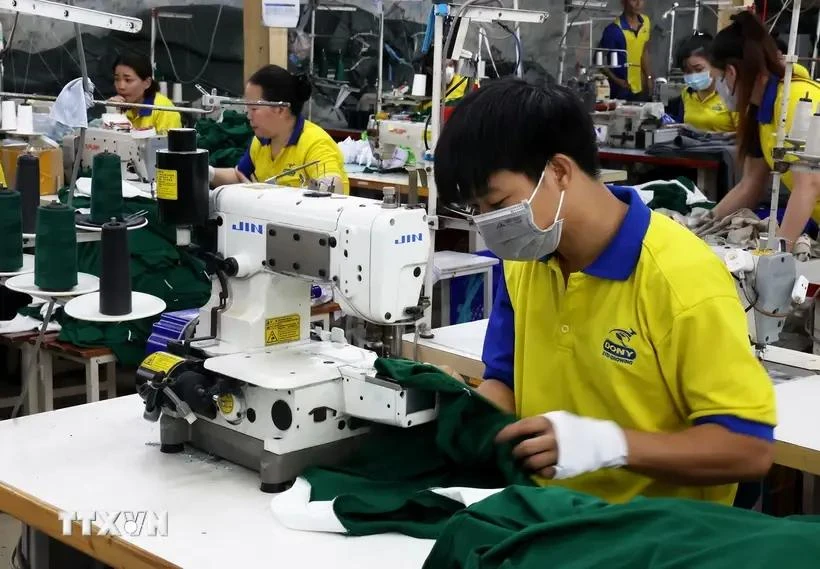 Vietnam is a key player in various global value chains, especially in manufacturing and export-oriented industries like garment and textile. (Photo: VNA)